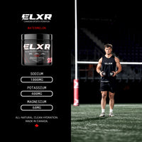 ELXR sports drink mix container with a person holding it on a sports field.