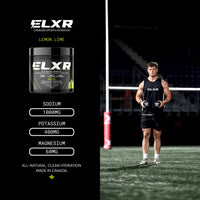 ELXR sports drink mix container with a person holding it on a sports field.